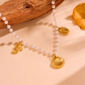 Collana di perle in acciaio inossidabile dorato con ciondoli a stella marina e conchiglia - Collana di Perle Conchiglia (H603)