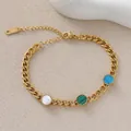 Close-up of golden chain bracelet featuring green, blue, and white circular stone inlays - Tricolor Round Thin Chain Style (JY142-07)