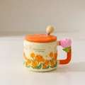 Ceramic tulip mug with orange lid and spoon, cream finish with floral pattern - With Lid and Spoon / Orange