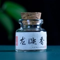 Handmade Longyan incense pearls in a glass jar with cork stopper for aromatherapy - Ambergris Scent (Dry Pills)