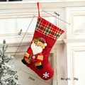 Christmas stocking with red burlap and Santa doll featuring red-green plaid cuff detail - Medium Linen Santa Style