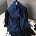 Close-up of deep blue cashmere-feel scarf featuring soft tassels and premium texture - Dark Blue