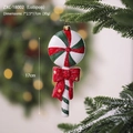 Christmas tree hanging ornament with red and white candy cane design and glitter bow - Lollipop