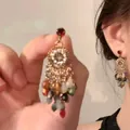 Detail of vintage bohemian drop earrings featuring colorful teardrop beads and gold alloy - 9# Silver Earring Post - Multicolor