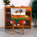 Detailed view of Christmas reindeer chair cover with red sequins and 3D plush antlers - Reindeer