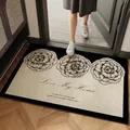 Beigefarbene Blumenmatte für den Eingang mit schwarzem Rand und Love My Home Aufdruck - Beige Pfingstrose Zuhause