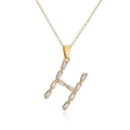 Close-up of 18K gold-plated necklace with sparkling zircon-studded letter H pendant - Letter H