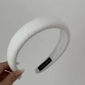Detail of white terry cloth headband with Hand Made label and soft towel texture - Headband / Cream