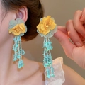 Detail of light green mesh petal earrings with long sequin tassels and yellow core - 8# Green Silver Needle