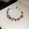 Detail van zilveren armband met veelkleurige zirkonia en een verstelbare verlengketting - 27# Armband - Meerkleurig-Roze Hart