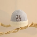 Close-up of baby winter knit hat with brown bear embroidery and ribbed texture - One Size (6 Months-2 Years) / Blue