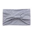 Grey cotton yoga headband with a stylish knotted bow design on a white background - Light Grey