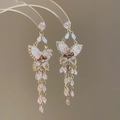 Detailed close-up of butterfly earrings with opal wings and long beaded tassels - Gold & Pink Butterfly Tassel (32#)