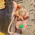 Brown Capybara glowing keychain with spinning wheel charm and golden metal ring - Capybara Spinner - Turtle