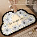 Cloud-shaped beige bath mat with floral print and The Beauty Life text on wood floor - American Cloud Style - H