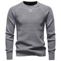 Detail of light grey knit sweater showing ribbed crew neck and premium fabric texture - S / Medium Grey