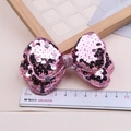 Sparkly pink sequin bow hair clip for girls with 8-9cm width shown with ruler scale - Silver Pink