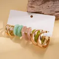 Set di 5 paia di orecchini a cerchio in metallo dorato e resina marmorizzata su carta - Perno in Acciaio - Oro (Set di 5 Paia)