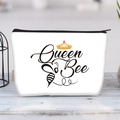 Detail of white canvas makeup bag with Queen Bee print and gold crown on a wooden table - Queen Bee Crown(jiayingljb27)