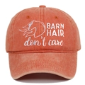 Close-up of Barn Hair Don't Care white embroidery on washed cotton orange baseball cap - Adjustable / Orange