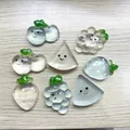 Translucent fruit squishy toys with cute faces on light wood background surface - Ice Transparent Fruit Series