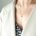 Elegante collana in titanio oro rosa con anello e ciondolo a barra minimalista - Oro rosa