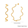 Detail showing wavy gold stainless steel hoop earrings with 6.2cm diameter and 10g weight - Wavy Large Hoop Earrings