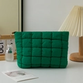 Vibrant green quilted clutch bag with padded square texture and zip closure - Green