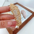 Exquisite 18K gold-plated feather brooch featuring pavé-set white and yellow zircon accents - Gold Champagne Zircon