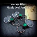 Retro bronze maple leaf pendant with faceted glass and green oval gemstone accents - Vintage Maple Leaf Pendant / Bronze Transparent Green