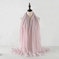 Detailed texture of light pink pleated cotton linen scarf with raw fringe edges - Pale Pink