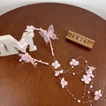 Pink floral girl headband with mesh butterflies and long pearl tassels on wood background - Pink Butterfly Pearl with Ribbon