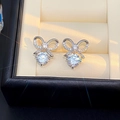 Bowtie S925 silver stud earrings featuring sparkling heart-cut moissanite stones - A Pair Of Platinum-gold Leds-163