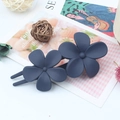 Matte navy blue double flower hair clip hair accessory on a decorative background - Navy Blue