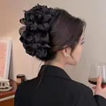Elegant black oversized mesh bow hair claw clip with layered tulle and 3D floral petals - Black Bow 19cm