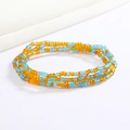 Detail of colorful layered glass seed bead body chain in blue and orange contrast - Orange Sky Blue