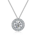 Macro shot of a sparkling halo pendant necklace with a round center stone in silver - 2-carat Round Bag Xl-41 (with Chain)
