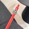 Red Christmas retractable gel pen featuring a green decorative resin Christmas tree charm - Red Christmas Tree