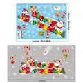 Detail showing Merry Christmas window decals with Santa, penguin, and snowflake layout - AMJ077 Merry Christmas