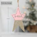 Pendaglio stella di Natale in legno rosa con paillettes dorate e intaglio X-MAS - 9.2x5.2cm/7.4g / Stella Rosa