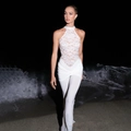 Elegant white lace patchwork jumpsuit for women featuring a halter neck and slim fit flared legs - S / White