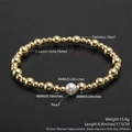 Bracciale in acciaio placcato oro con perla bianca e sfere alternate da 4mm e 6mm - Stile Perle Dorate con Perla (NJ05-4)