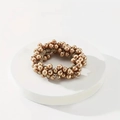 Elegant champagne gold beaded elastic hair tie with a smooth metallic luster finish - Champagne Gold