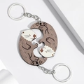 Pair of wooden otter puzzle keychains forming a heart shape for couple's gift - Wooden Otter Keychain 1 Pair