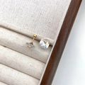 Golden square crystal stud earrings with screw back design on a wooden tray - Colorful White Cushion (10mm)