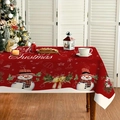 Red Christmas tablecloth with festive snowmen and bells print in a warm dining setting - 13 / 152cm*220cm