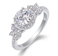 Detail of moissanite ring showing round center stone and floral diamond pavé accents - US 7 / Cluster Flower Round Style (R13145)