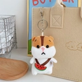 Brown and white hamster plush keychain with watermelon bag accessory on a beige bag - Fruit Hamster - Brown