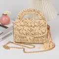 Close-up of beige crochet crossbody bag with golden metallic swivel lock and tassel detail - 20*6*15cm / Off White