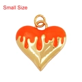 Small heart pendant in gold finish with orange enamel drip detailing and dual ring top - Drip Heart Orange Small